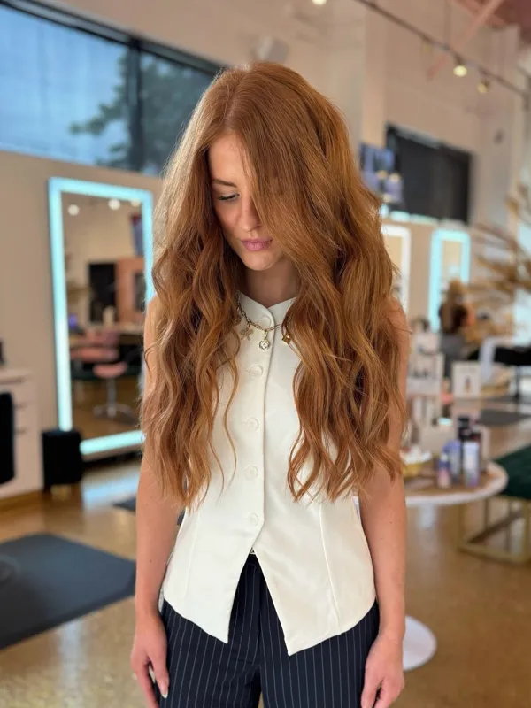 Long copper red hair with loose waves by Christina White Salon