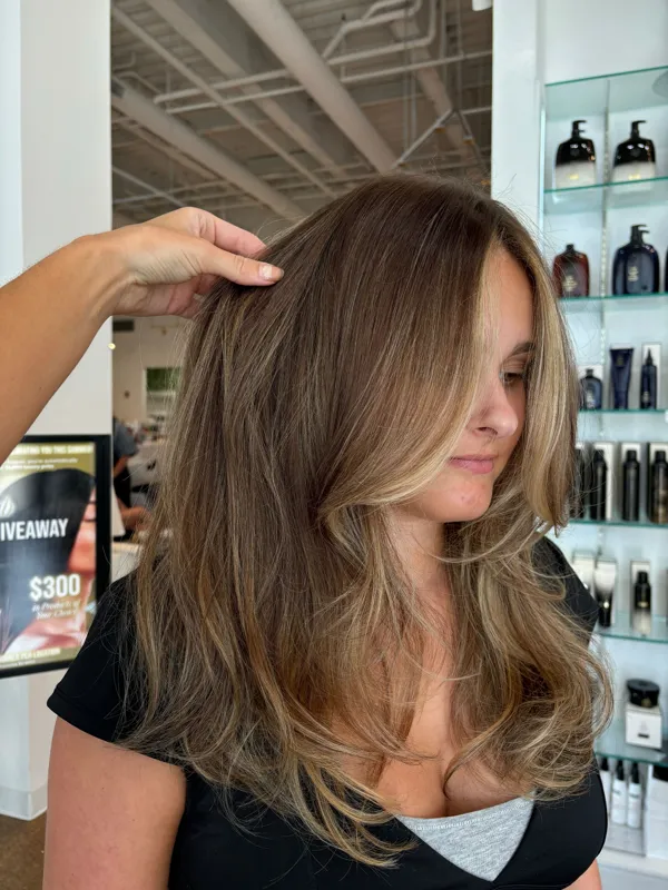Brunette balayage with soft caramel highlights by Christina White Salon
